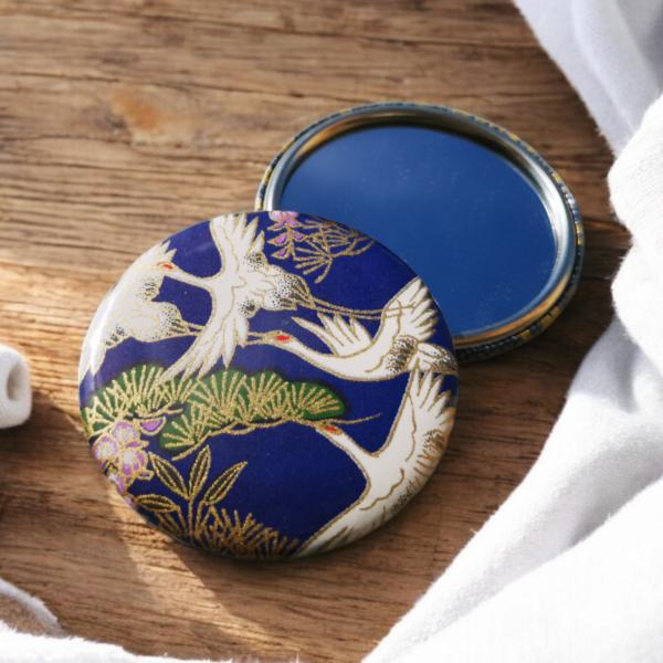 Miroir de poche - grues bleu-